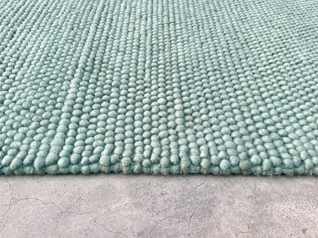 Pebbles Green Wool Hand Woven Rug